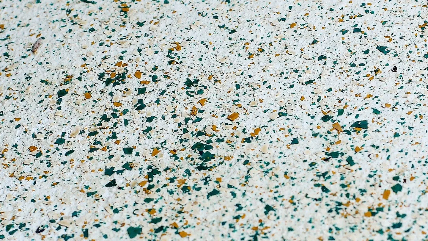 Premium epoxy-coated garage interior with organized cabinets and polished floor